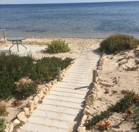 Sittin on the Beach - Tourism Search