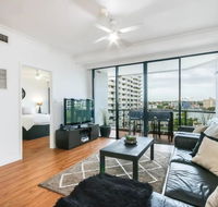Modern 2 Bedroom River View Apartment in Docklands - Tourism Search