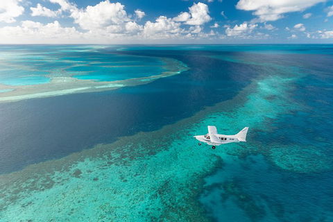 Great Barrier Reef Scenic Flight And Ocean Rafting Whitehaven Beach Day Trip - Tourism Search 3